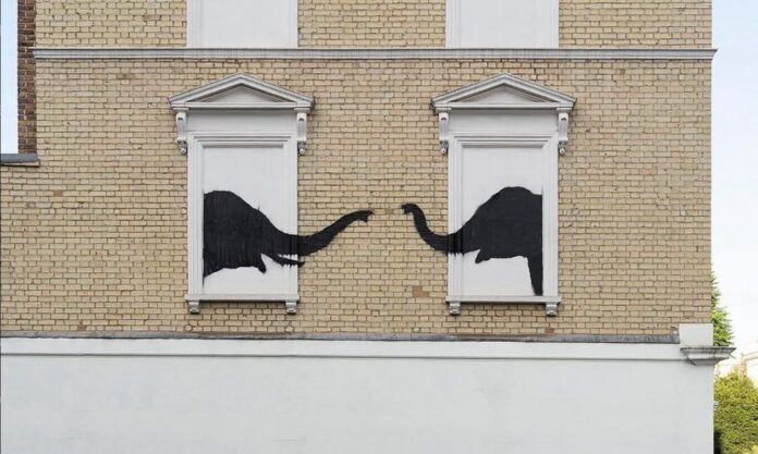 1573177-6747a3ac-banksy.jpg
