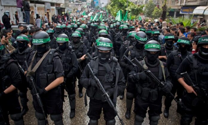 1574630-9bc98151-hamas-fighters.jpg