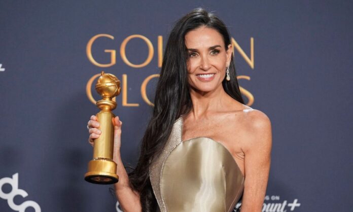 1616233-c9b23223-demi-moore-golden-globe.jpg