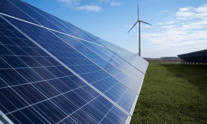 1650980-2c9cc29d-solar-pannels-wind-power-plant-outside.jpg