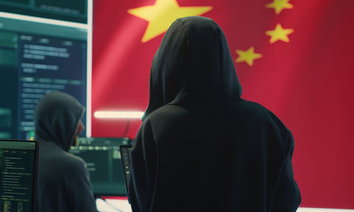 1713434-810d8de6-chinese-hacker-working-governmental-hacking-room-with-chinese-flag.jpg