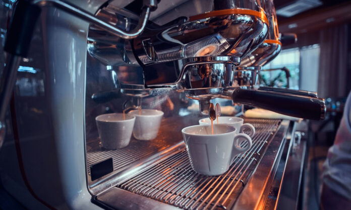 1751910-32943759-new-shiny-coffee-machine-coffee-shop-is-ready-start-making-coffee.jpg