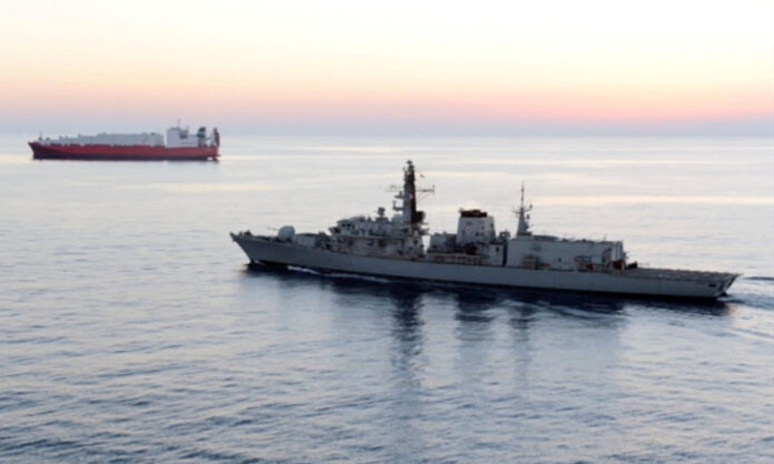 1754250-a-vessel-at-the-strait-of-hormuz.jpg